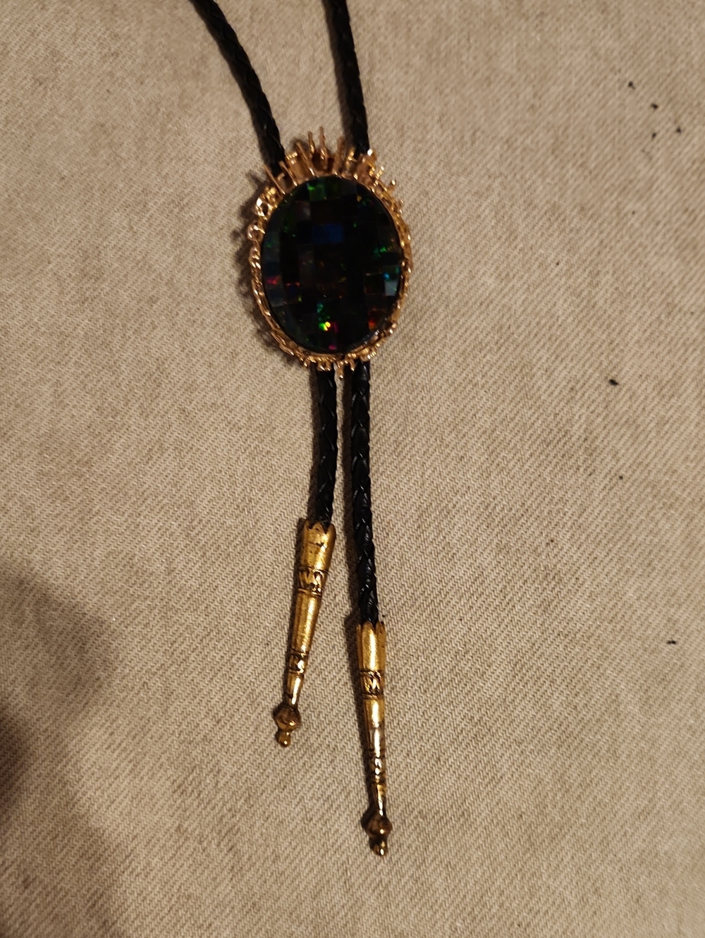 Gold-Tone Black Bolo Tie with Iridescent Oval Stone